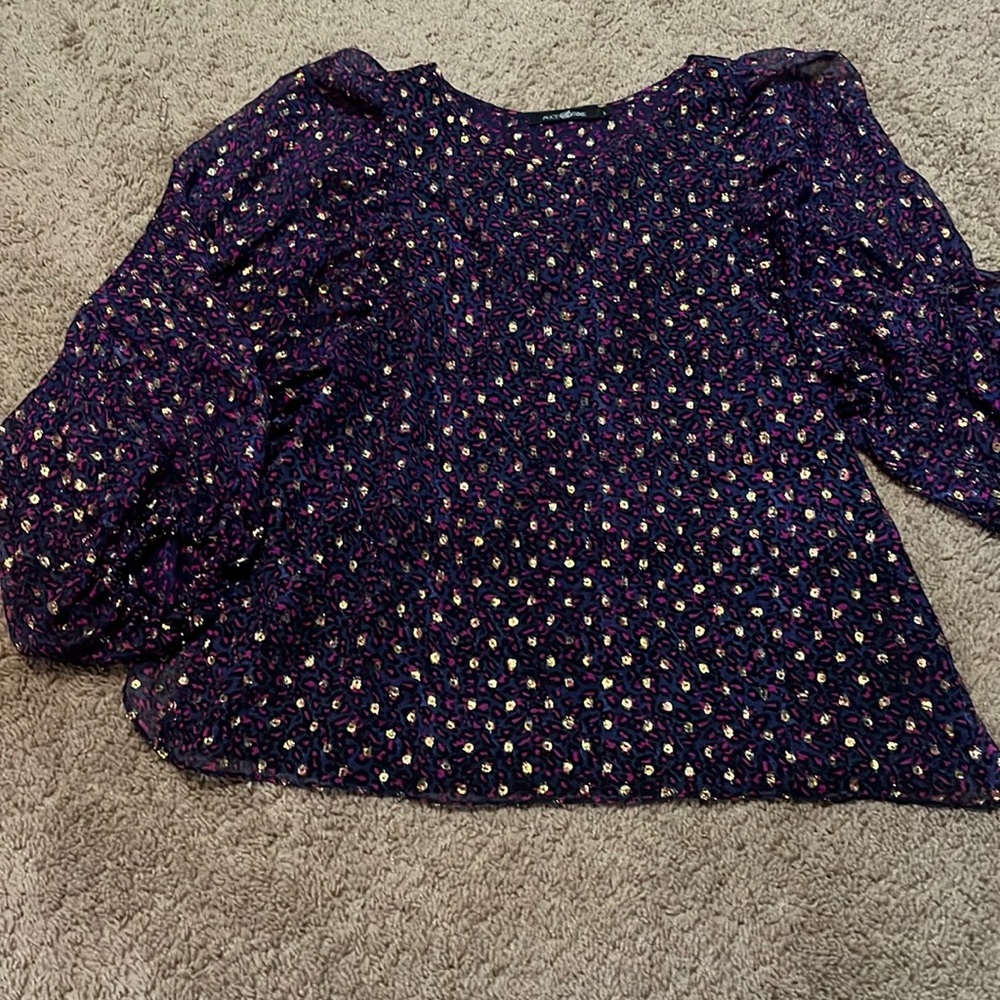 Alice and Trixie size large silk blend open back flutter top